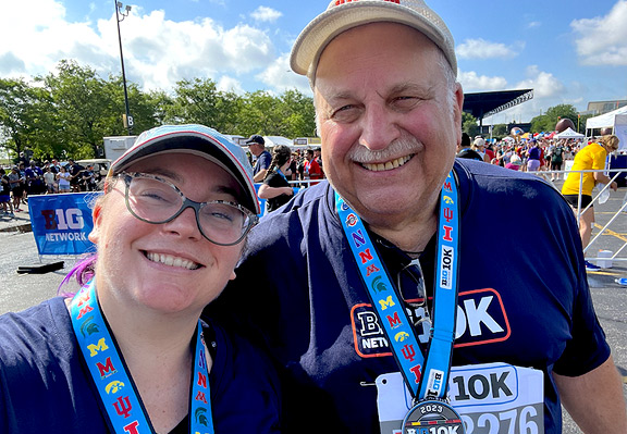 George and his daughter, Rachel, after running a 10K together.
